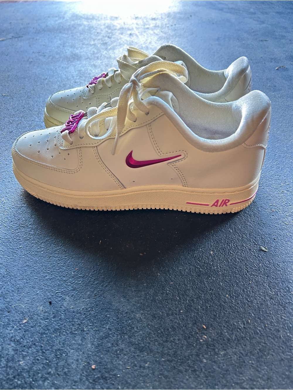 Nike White Sneakers with Pink Swoosh and Accents